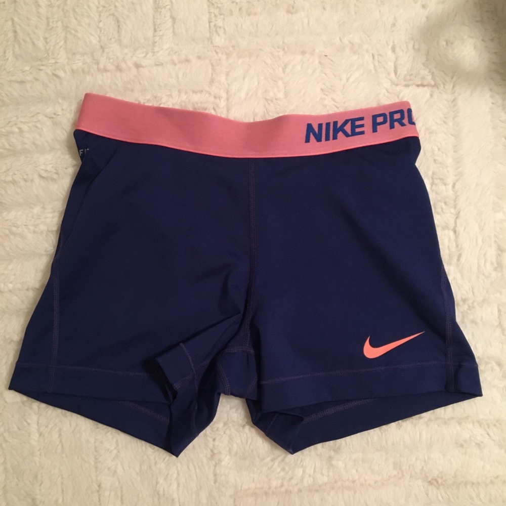 M Nike spandex — colors are royal blue and coral